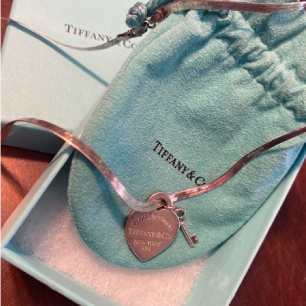 Tiffany & Co. Silver Heart Tag Necklace with Key Charm on Blue Pouch